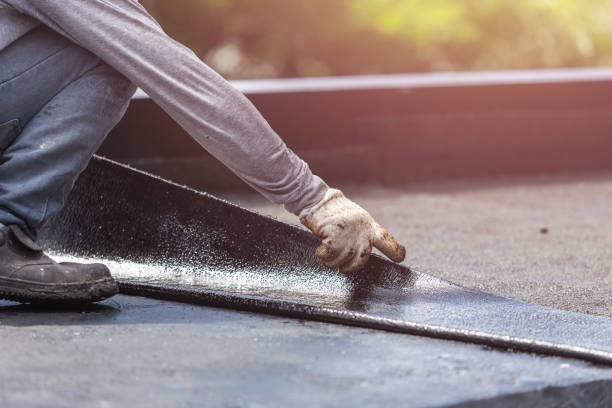 Professional Waterproofing technician working in Severn, MD